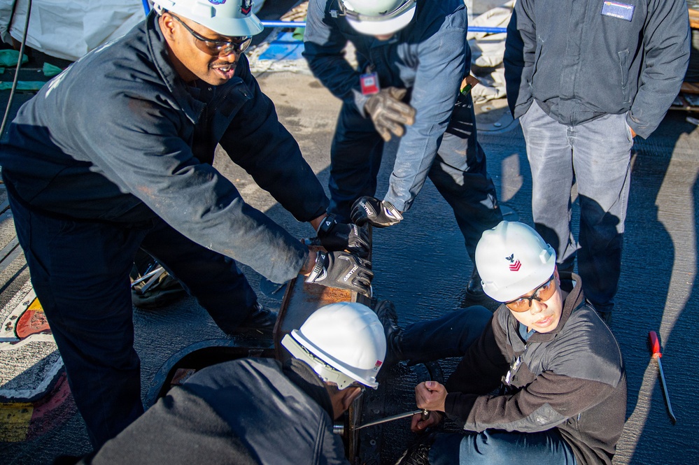 Ronald Reagan Sailors Conduct Maintenance