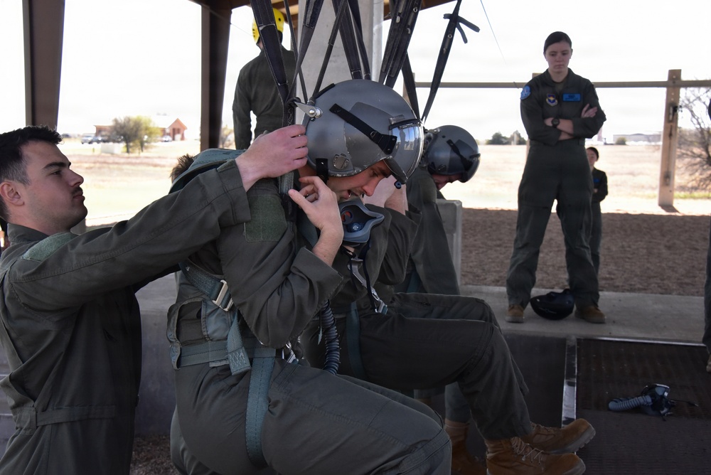 ENJJPT students perform parachute harness training