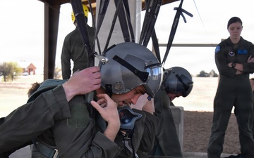 ENJJPT students perform parachute harness training