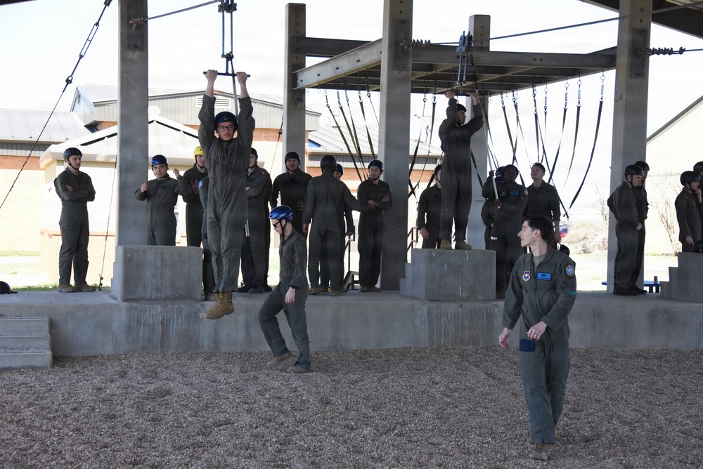 ENJJPT students perform parachute harness training