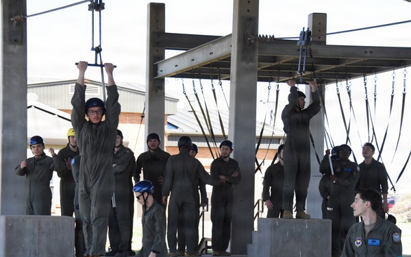 ENJJPT students perform parachute harness training
