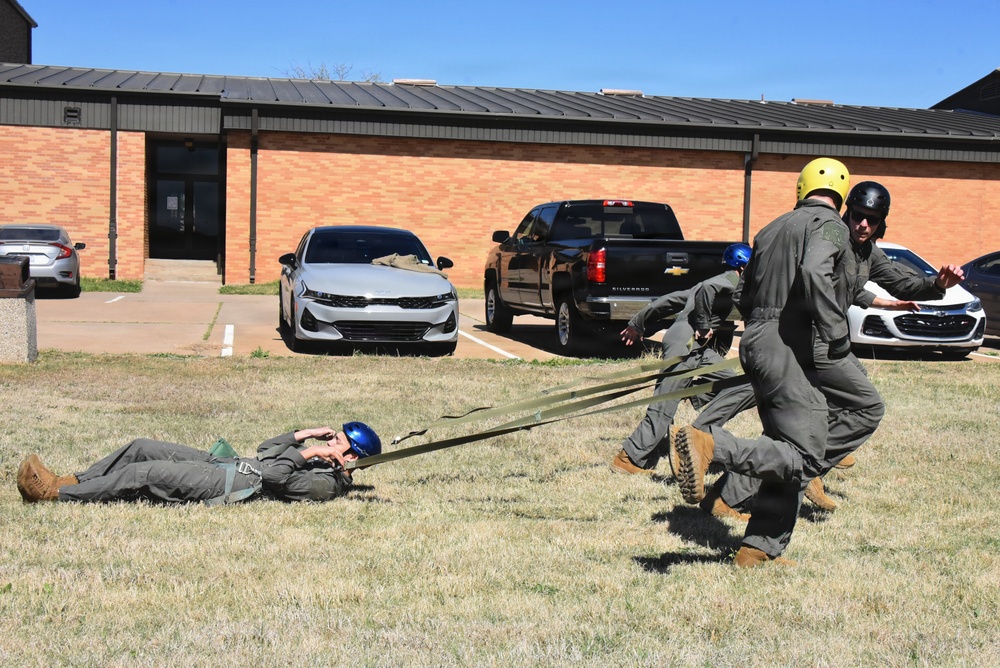 ENJJPT students perform parachute harness training