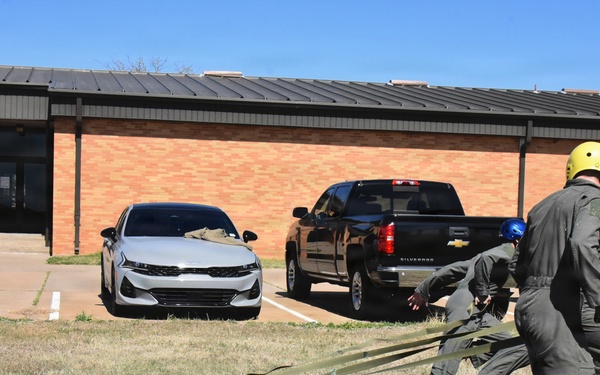 ENJJPT students perform parachute harness training