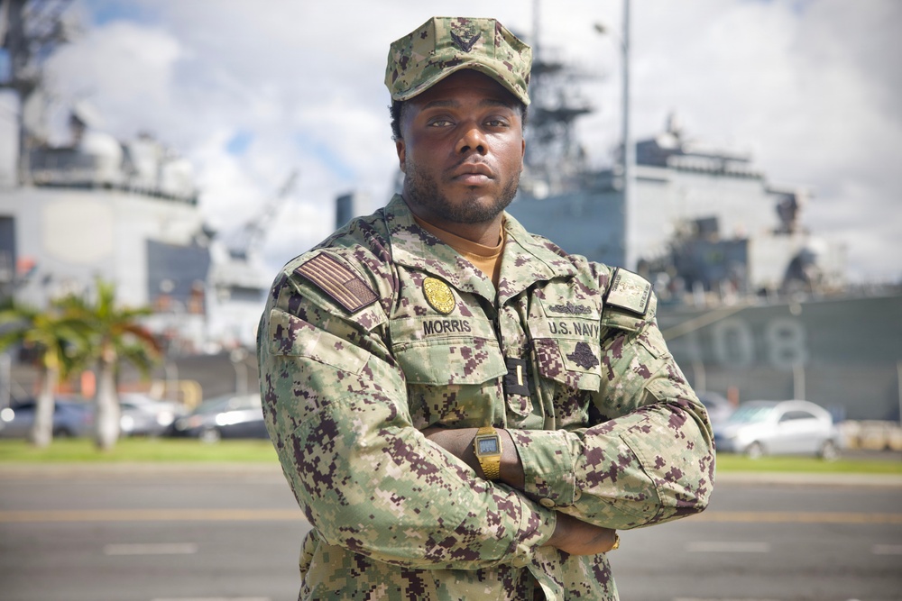 Navy Region Hawaii's Security Operations Officer, Ensign Sean Morris, earns a prestigious qualification signifying proficiency across all Navy security force mission areas.