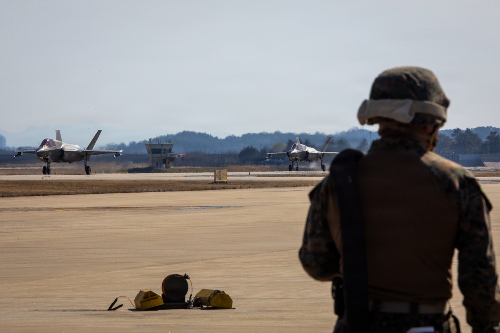 U.S. Marines refuel aircraft at forward arming, refueling point