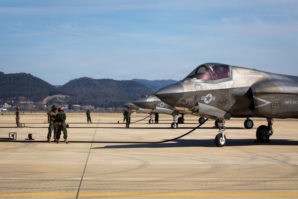 U.S. Marines refuel aircraft at forward arming, refueling point