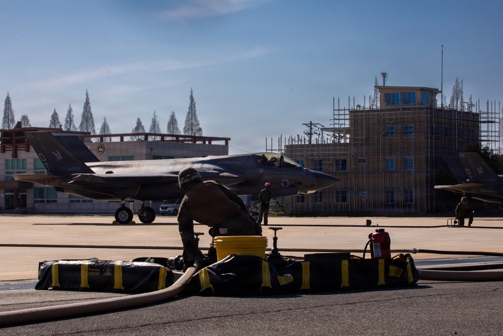 U.S. Marines refuel aircraft at forward arming, refueling point