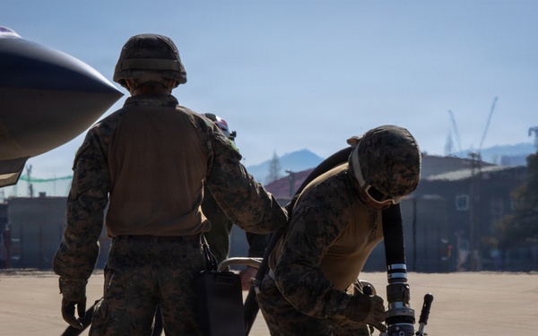 U.S. Marines refuel aircraft at forward arming, refueling point