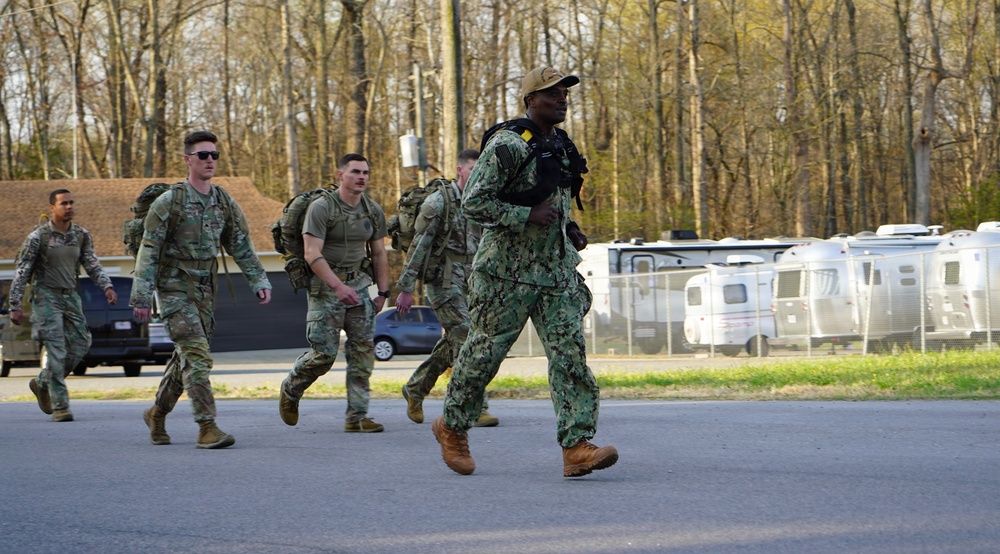 Weapon Station Yorktown's Command Master Chief tackles a grueling Norwegian Ruck March event held onboard the installation