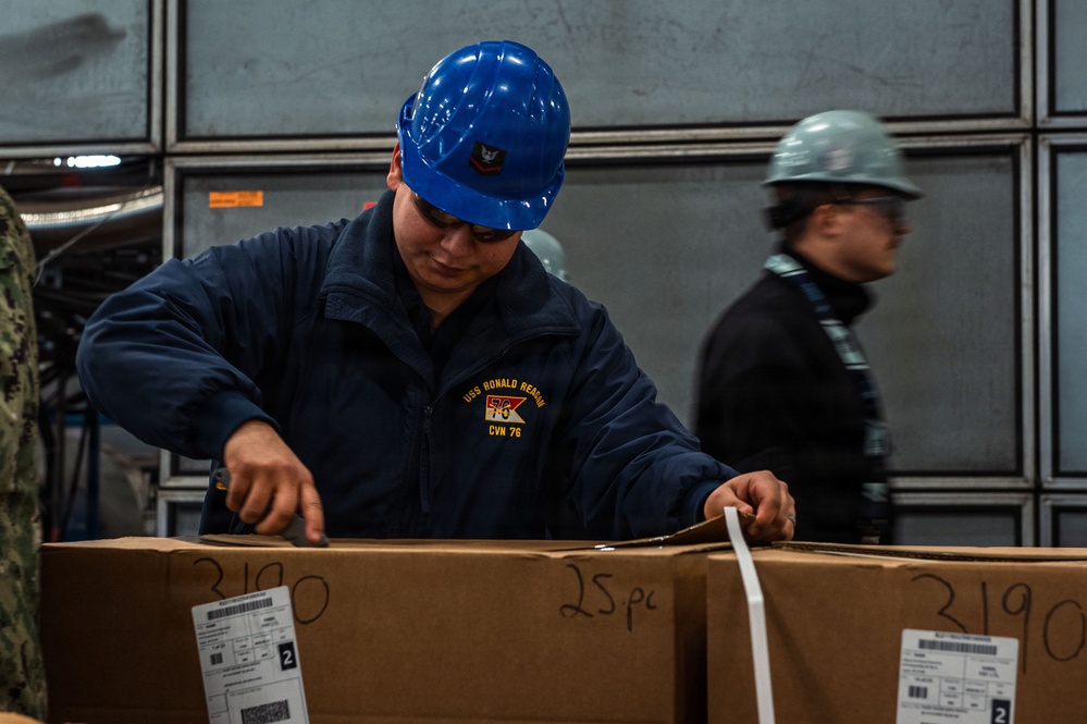Ronald Reagan Sailors Re-supply Equipment
