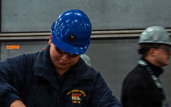 Ronald Reagan Sailors Re-supply Equipment