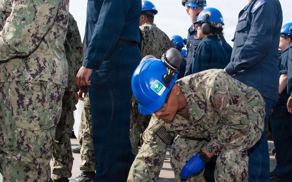 Sailors Conduct FOD Walkdown Aboard USS John C. Stennis