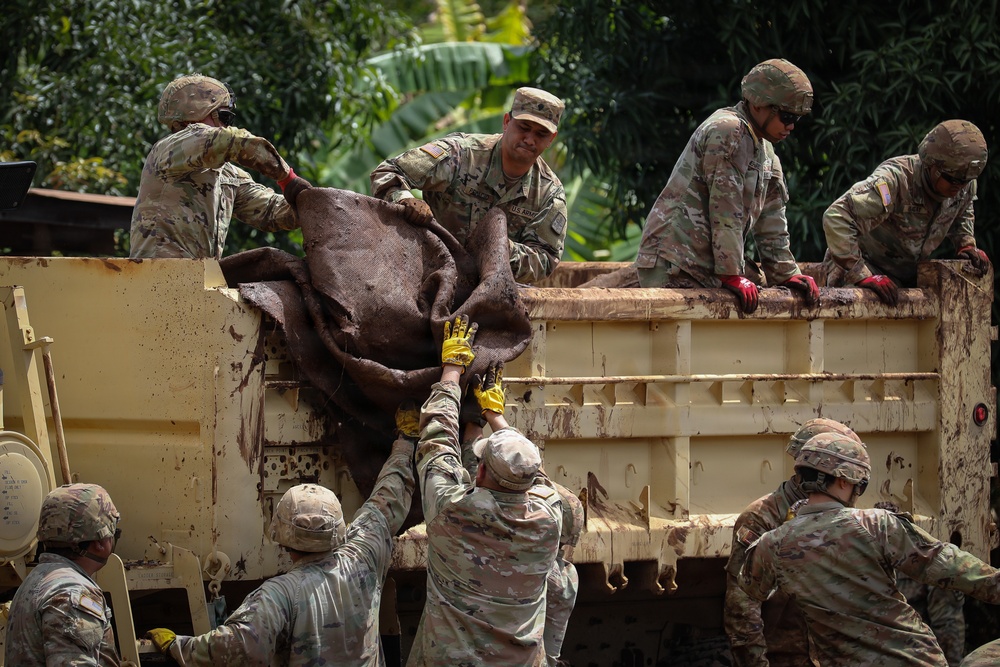 Hawaii National Guard assists Waialua residents with flood debris removal