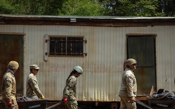 Hawaii National Guard assists Waialua residents with flood debris removal