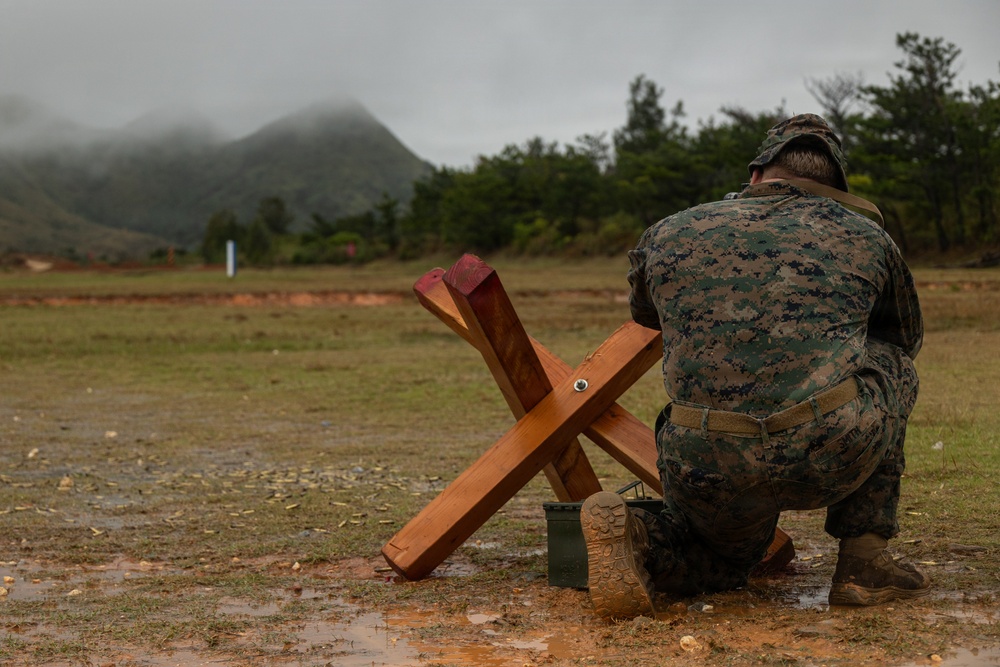 U.S. Marines compete in the Okinawa Intramural Marksmanship Competition at Camp Hansen