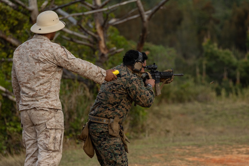 U.S. Marines compete in the Okinawa Intramural Marksmanship Competition at Camp Hansen