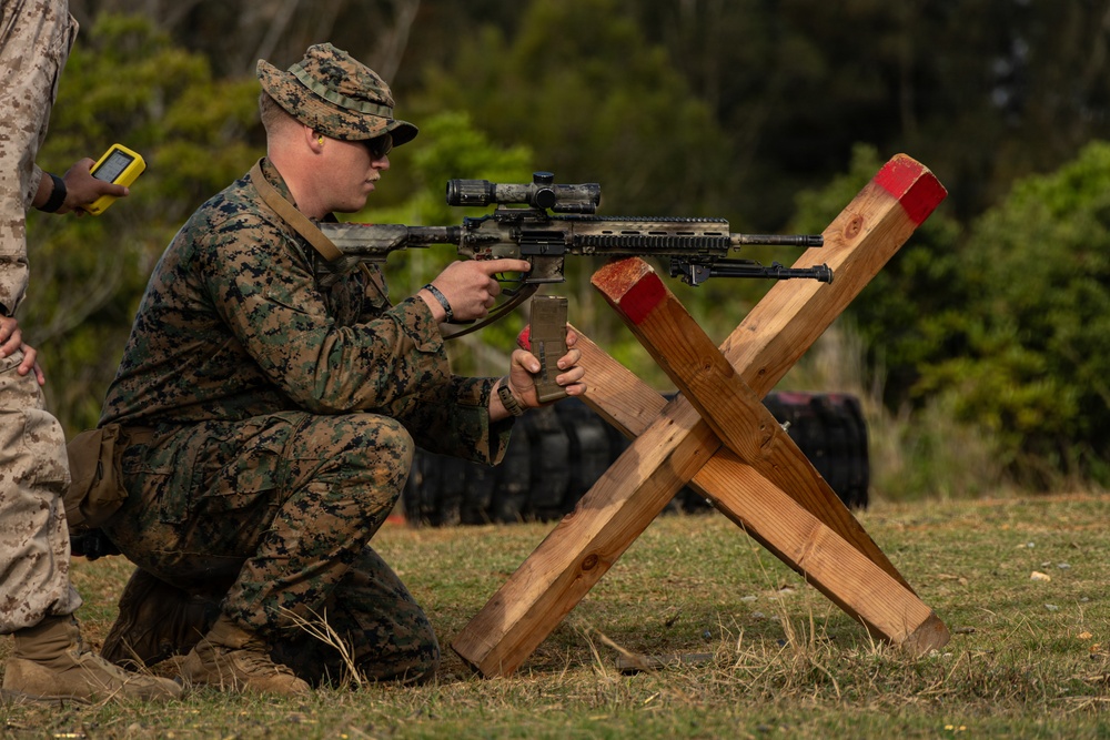 U.S. Marines compete in the Okinawa Intramural Marksmanship Competition at Camp Hansen