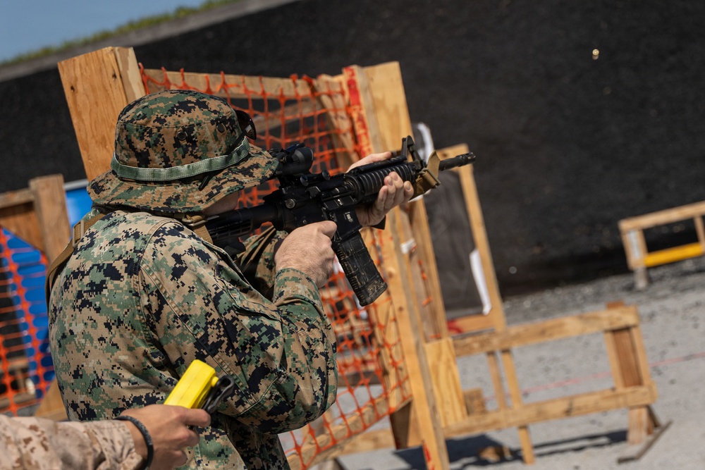 U.S. Marines compete in the Okinawa Intramural Marksmanship Competition at Camp Hansen