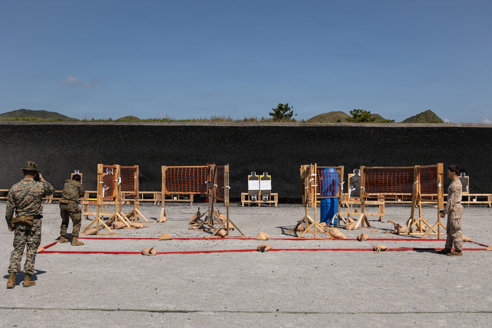 U.S. Marines compete in the Okinawa Intramural Marksmanship Competition at Camp Hansen
