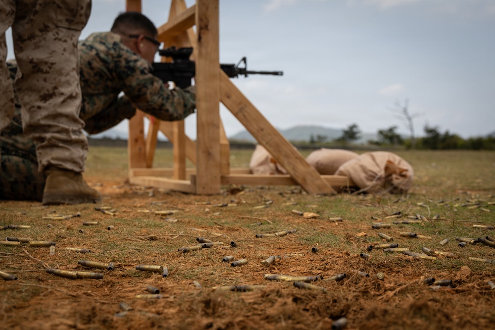 U.S. Marines compete in the Okinawa Intramural Marksmanship Competition at Camp Hansen