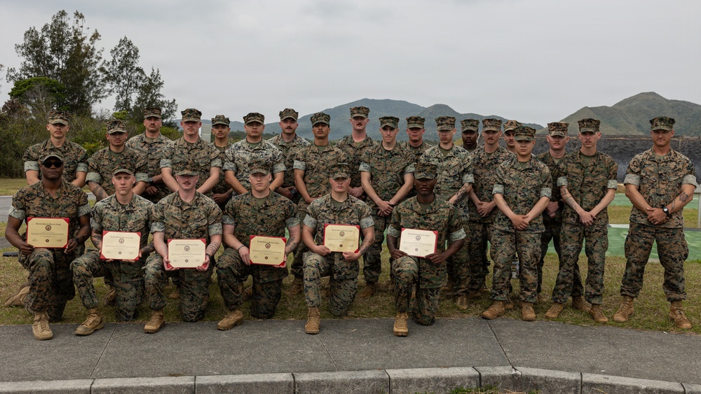 U.S. Marines compete in the Okinawa Intramural Marksmanship Competition at Camp Hansen