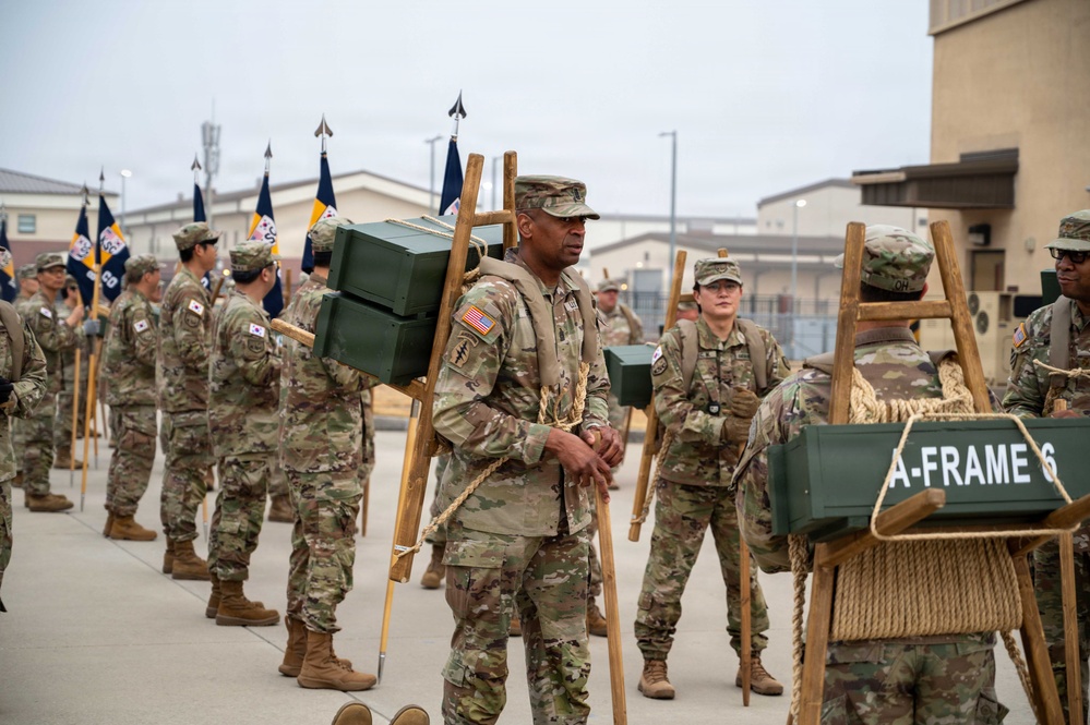 The Korean Service Corps (KSC) Battalion commemorated its 75th anniversary with an A-frame ruck march at Camp Humphreys on Mar. 26, honoring the tool's historical significance.