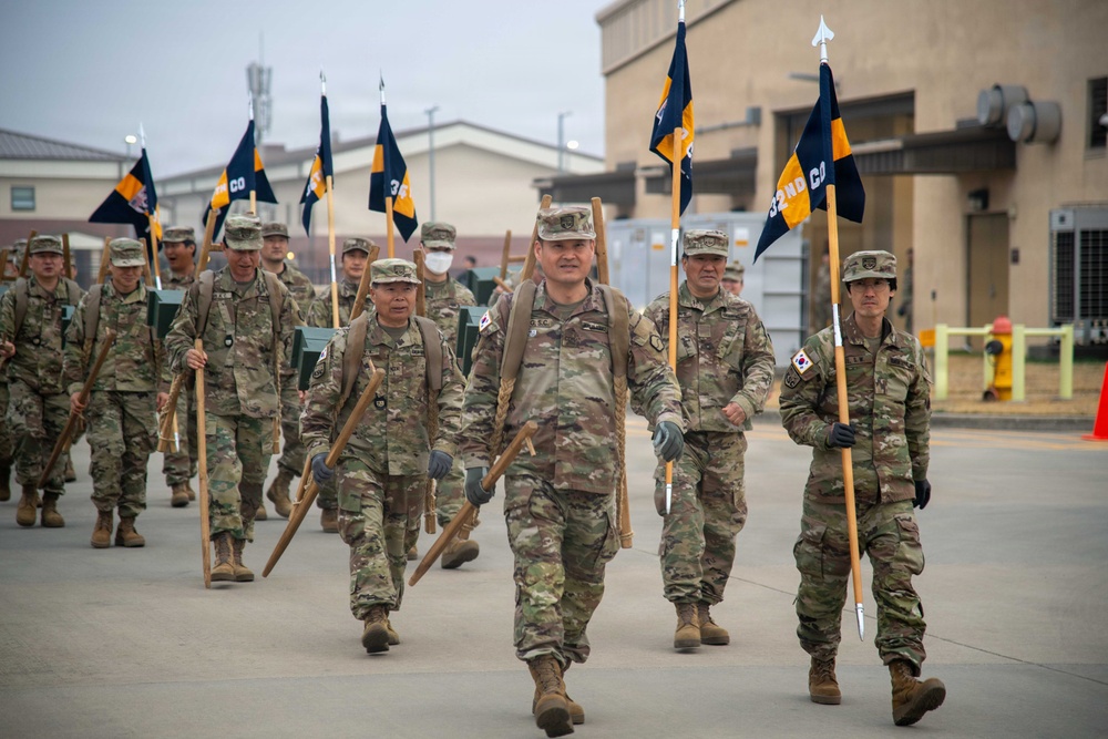 The Korean Service Corps (KSC) Battalion commemorated its 75th anniversary with an A-frame ruck march at Camp Humphreys on Mar. 26, honoring the tool's historical significance.