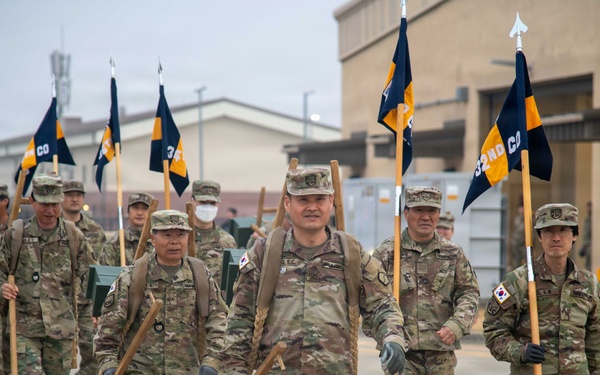 The Korean Service Corps (KSC) Battalion commemorated its 75th anniversary with an A-frame ruck march at Camp Humphreys on Mar. 26, honoring the tool's historical significance.