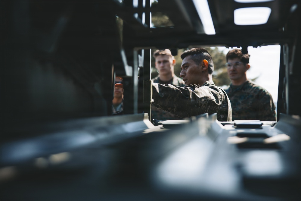 5th Air Naval Gunfire Liaison Company Marines, Republic of Korea service members conduct communications setup and weapons familiarization during Freedom Shield 26