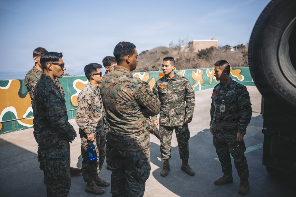 5th Air Naval Gunfire Liaison Company Marines, Republic of Korea service members conduct communications setup and weapons familiarization during Freedom Shield 26