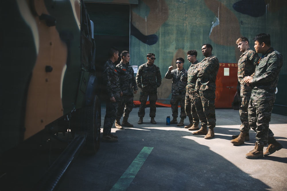 5th Air Naval Gunfire Liaison Company Marines, Republic of Korea service members conduct communications setup and weapons familiarization during Freedom Shield 26