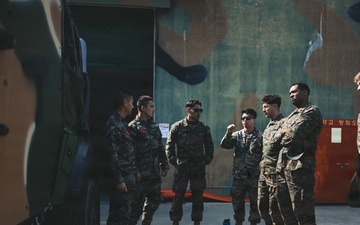 5th Air Naval Gunfire Liaison Company Marines, Republic of Korea service members conduct communications setup and weapons familiarization during Freedom Shield 26