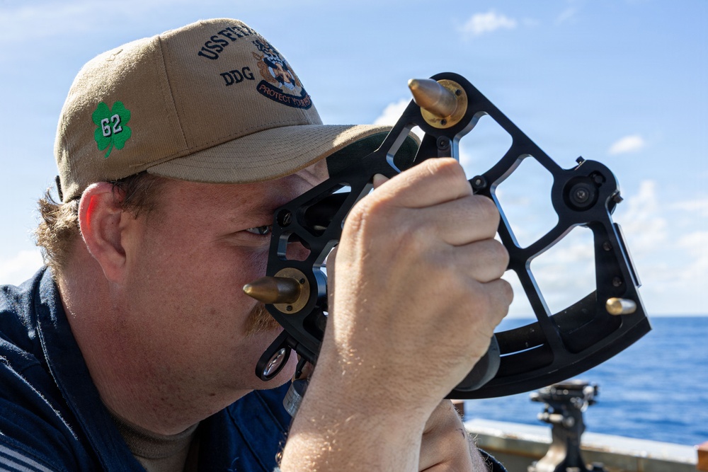 USS Fitzgerald conducts a replenishment-at-sea with MV Asterix during Kakadu 2026