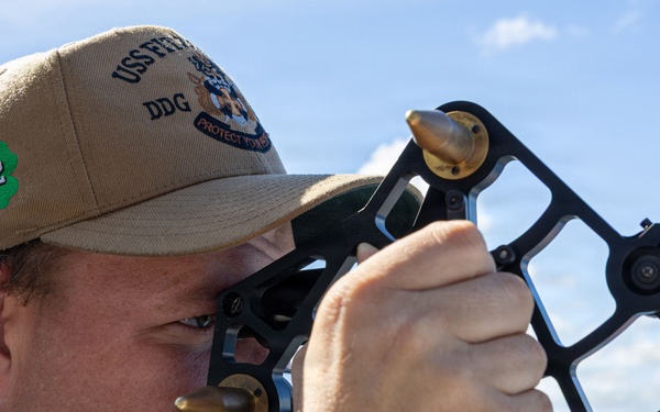 USS Fitzgerald conducts a replenishment-at-sea with MV Asterix during Kakadu 2026