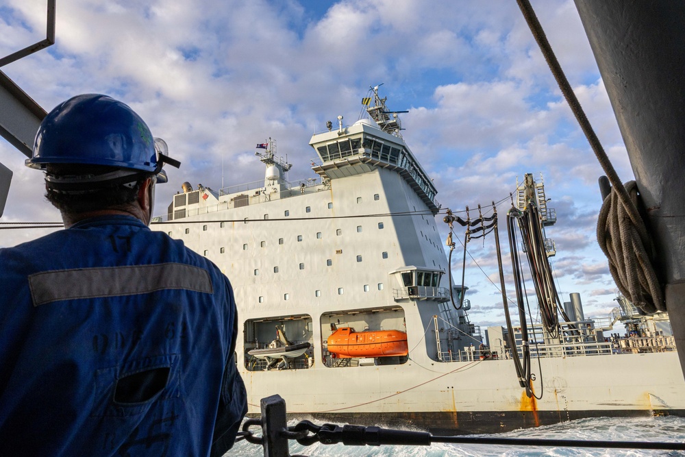 USS Fitzgerald conducts a replenishment-at-sea with MV Asterix during Kakadu 2026