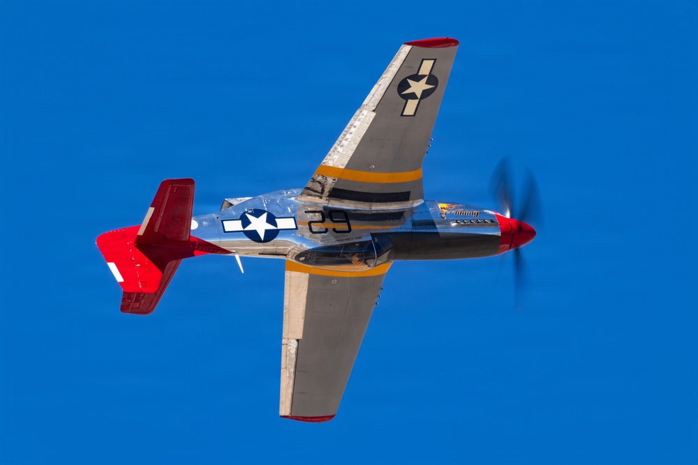 A P-51 Mustang flies over Luke Air Force Base