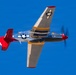 A P-51 Mustang flies over Luke Air Force Base