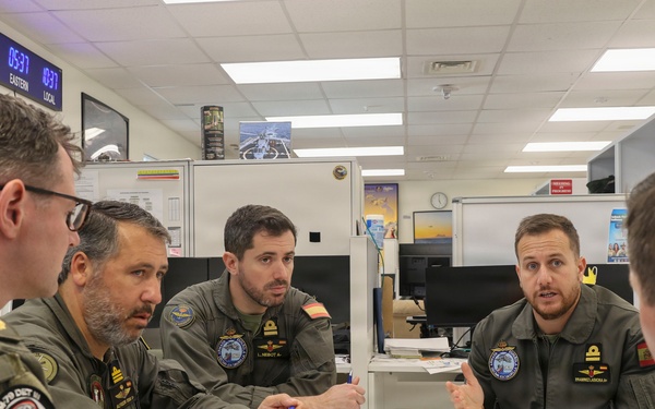 U.S. Navy service members from HSM-79 conduct interoperability planning with the Spanish Armada.