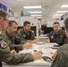 U.S. Navy service members from HSM-79 conduct interoperability planning with the Spanish Armada.