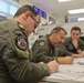U.S. Navy service members from HSM-79 conduct interoperability planning with the Spanish Armada.