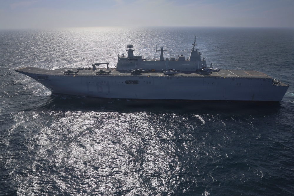 U.S. Navy MH-60R Seahawks from HSM-79 conduct interoperability exercises with the Spanish Juan Carlos I (L 61)