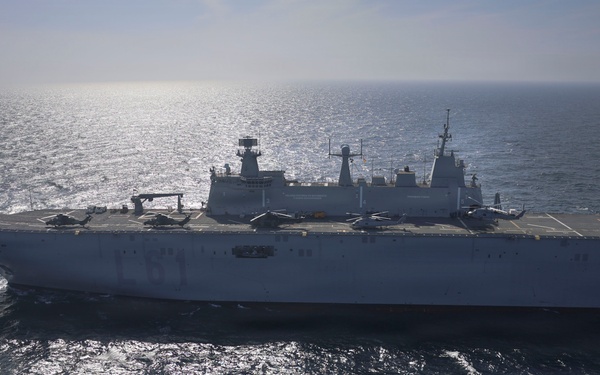 U.S. Navy MH-60R Seahawks from HSM-79 conduct interoperability exercises with the Spanish Juan Carlos I (L 61)