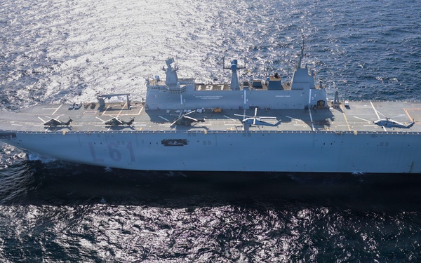 U.S. Navy MH-60R Seahawks from HSM-79 conduct interoperability exercises with the Spanish Juan Carlos I (L 61)