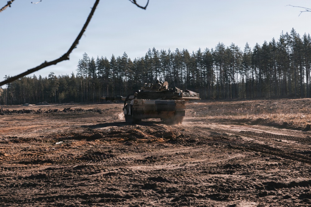 U.S. Soldiers operate Abrams tank during combined training in Estonia