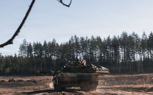 U.S. Soldiers operate Abrams tank during combined training in Estonia
