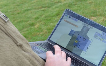 Indiana National Guard soldiers test electronic targets during casualty evacuation training