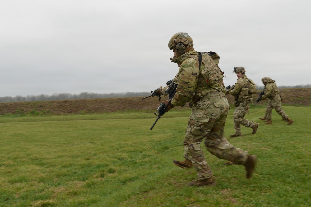 Indiana National Guard soldiers test electronic targets during casualty evacuation training