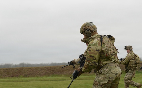 Indiana National Guard soldiers test electronic targets during casualty evacuation training