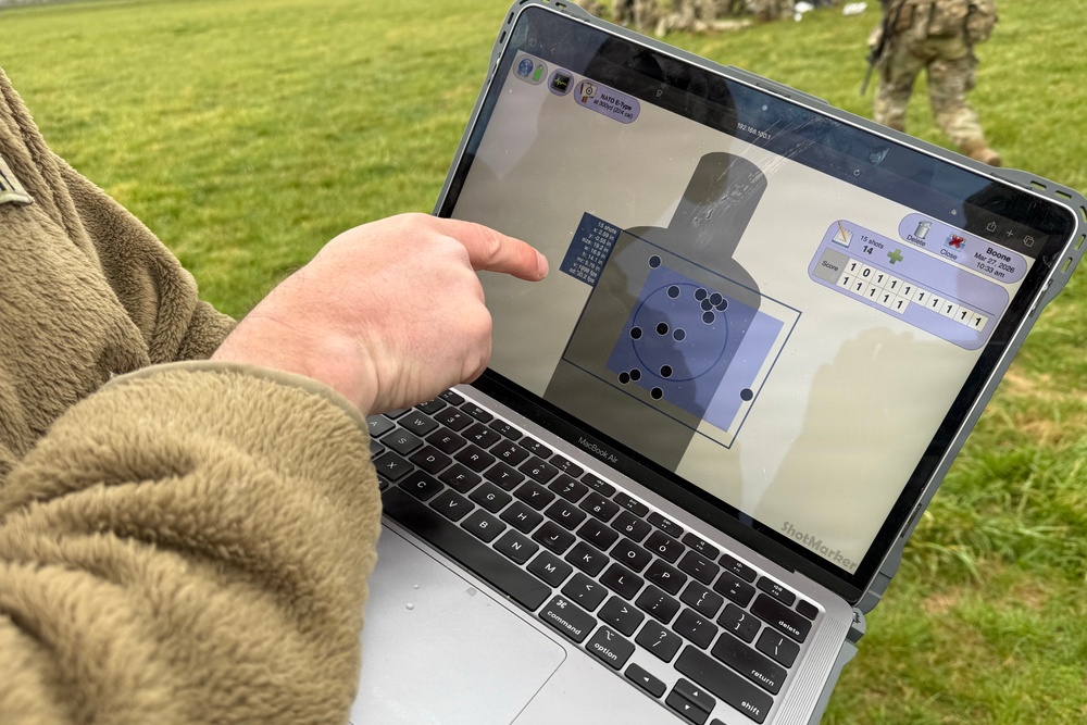 Indiana National Guard soldiers test electronic targets during casualty evacuation training
