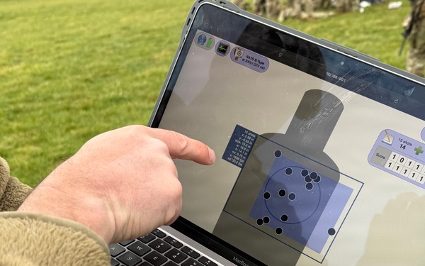 Indiana National Guard soldiers test electronic targets during casualty evacuation training